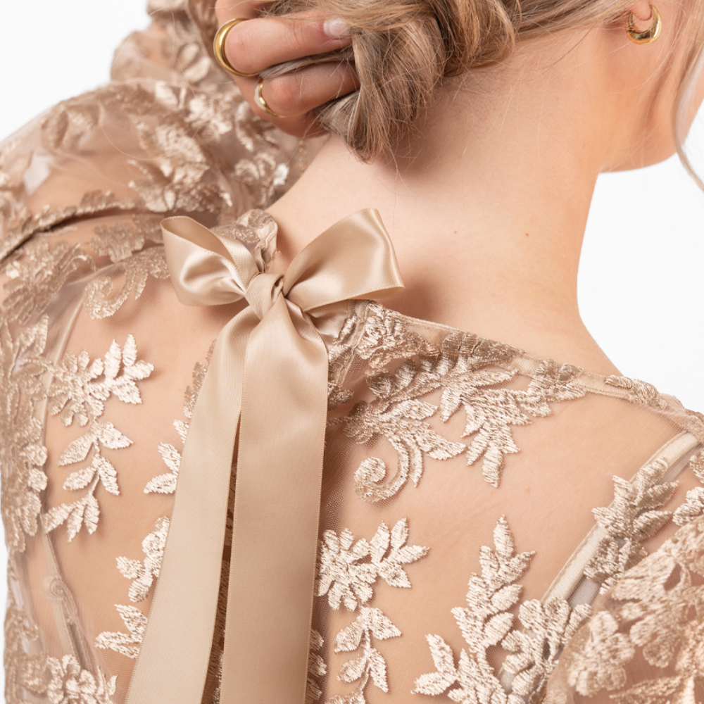Blus Amandine, Guld
