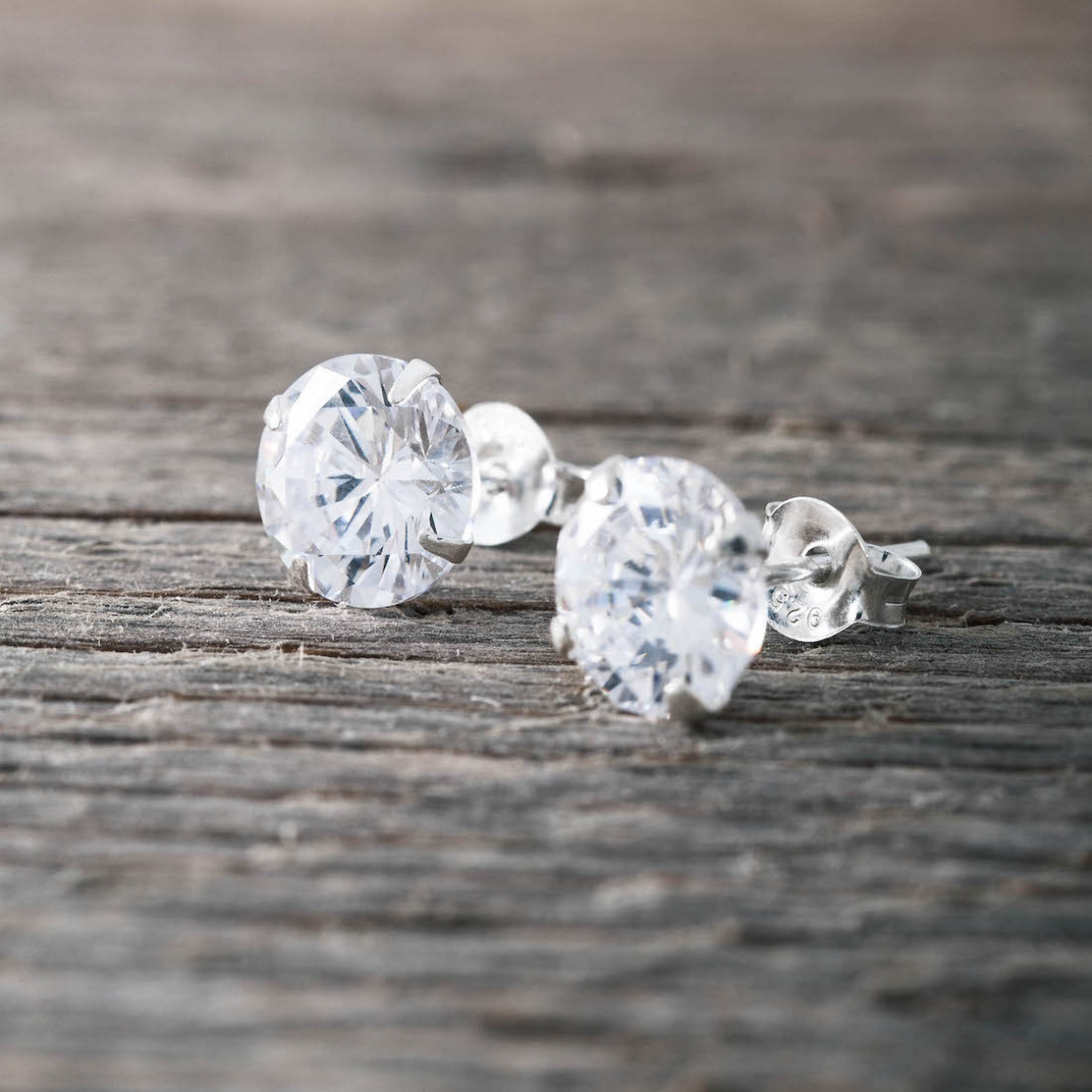Faith silver med vit sten